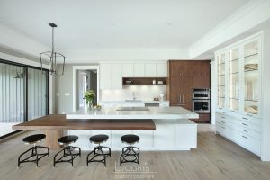 Otterview white and natural wood kitchen with unique island 01