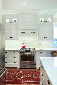 Parkhouse white painted custom kitchen with decorative legs 07