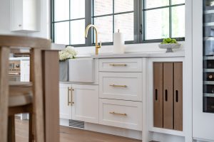 white cabinets custom cutting board pullout