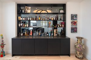 custom bar cabinets mirrored backsplash