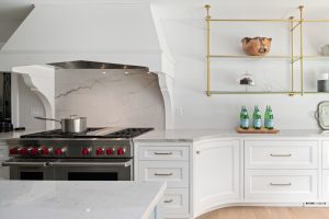 white kitchen with metal shelving