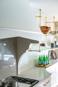 gold metal shelves white kitchen