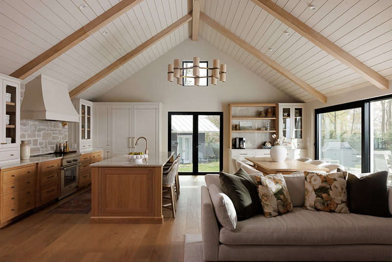 Open concept home with a mix of stained white oak cabinetry and white painted cabinetry