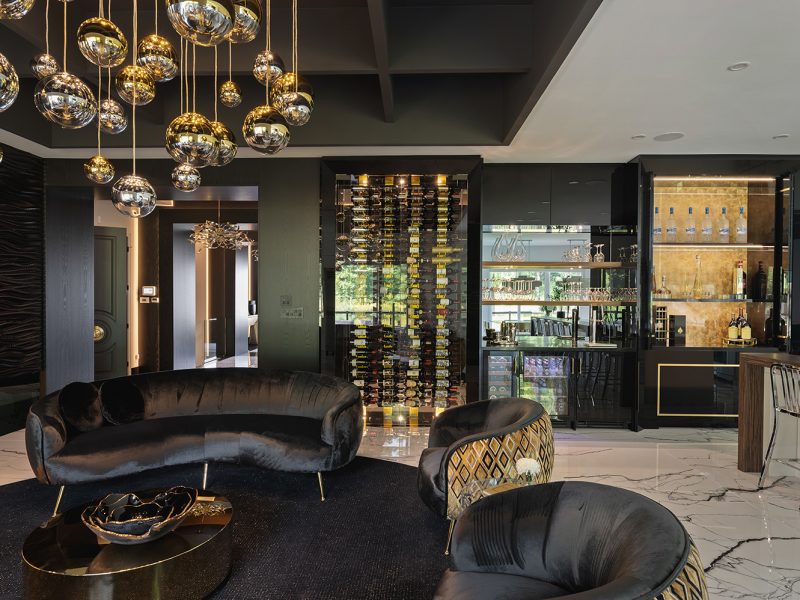 Pocket door cabinet with hidden bar