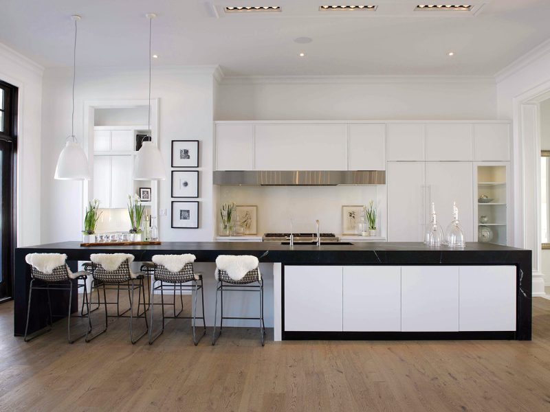 Black countertop on white kitchen island
