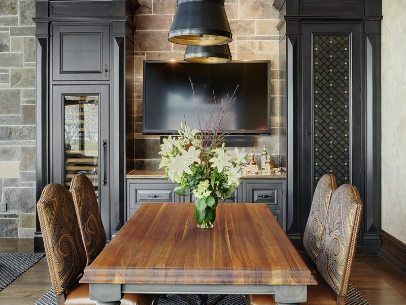 Black dining room cabinets with wine storage