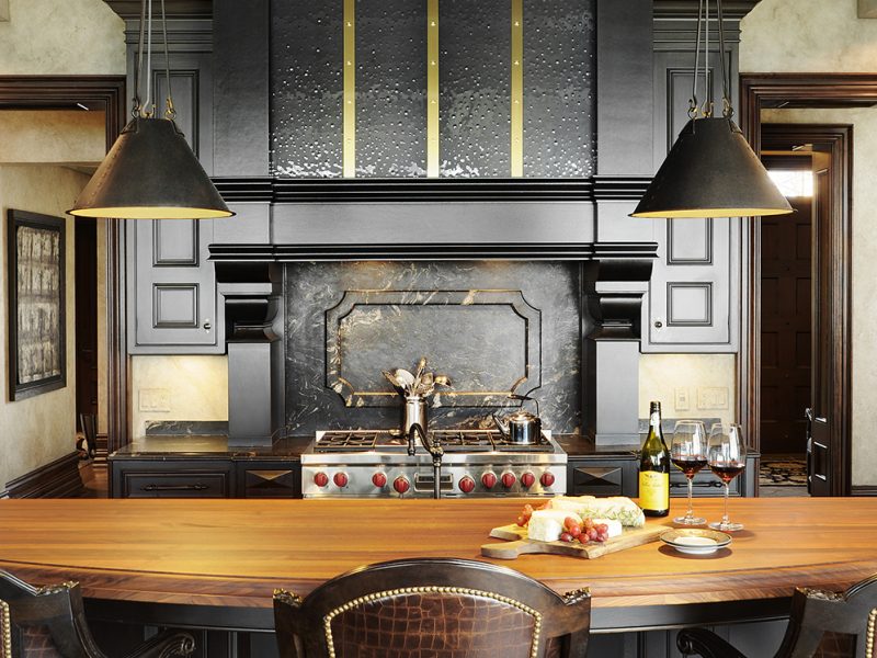 Black and gold range hood