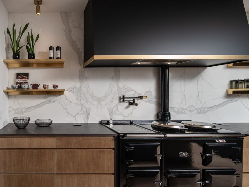 Black and gold range hood