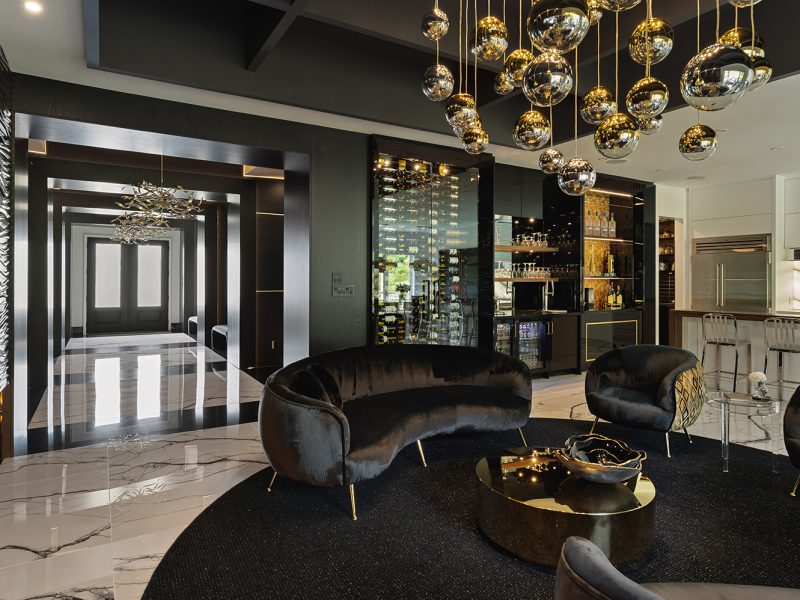 Modern black living room with hidden bar