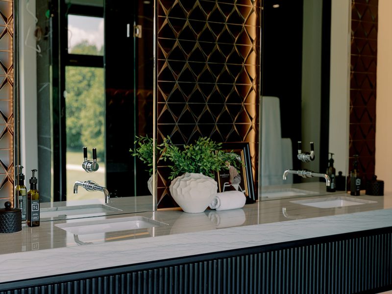 Black reeded vanity in primary ensuite