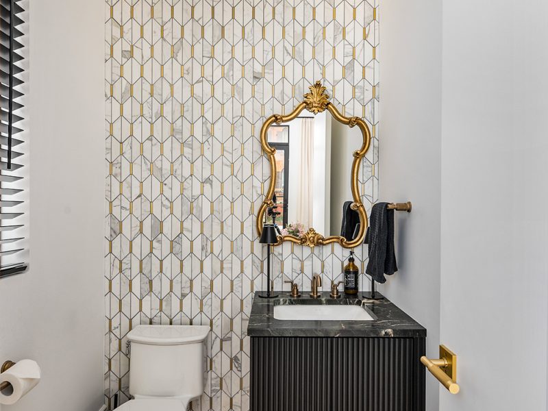 Black vanity with reeded detail