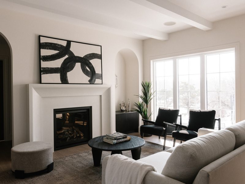 Monochromatic living room with subtle arch