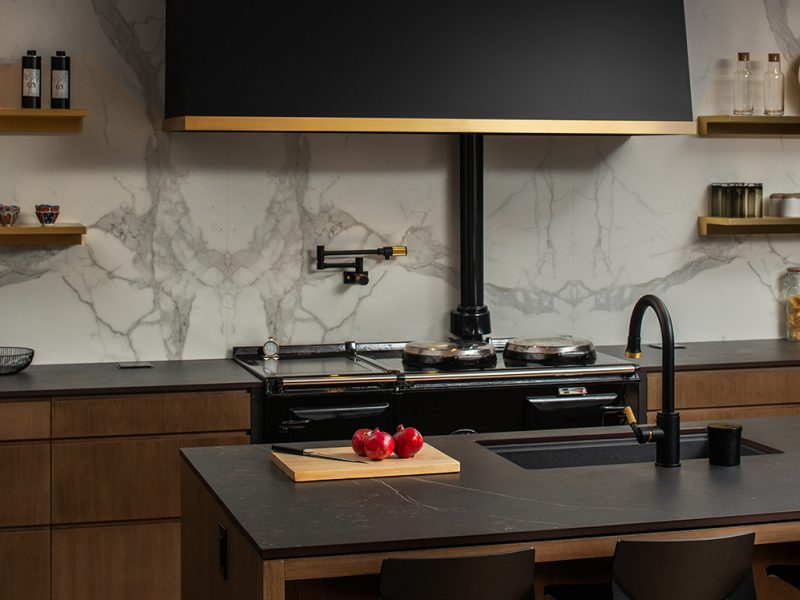 Dark kitchen with wood cabinets