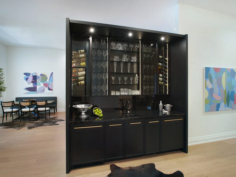 Black wine cabinet inside kitchen