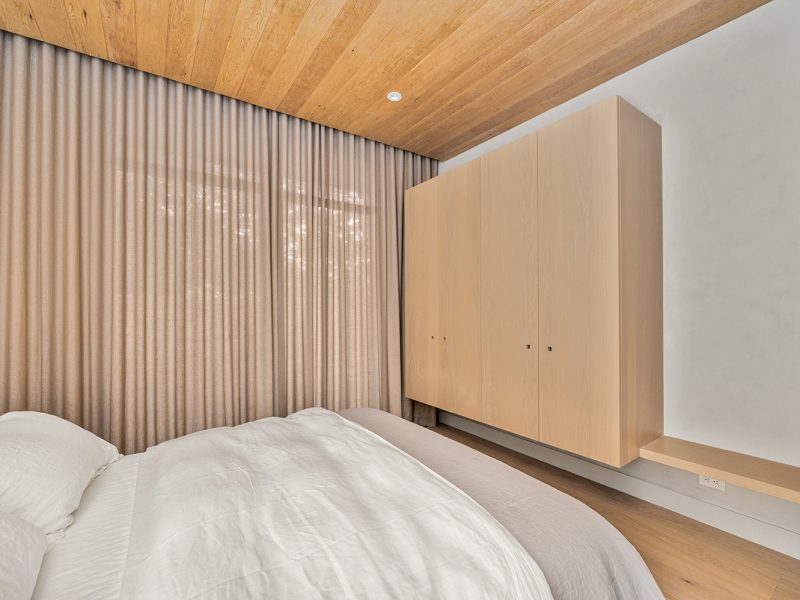 Closet cabinet with attached bench