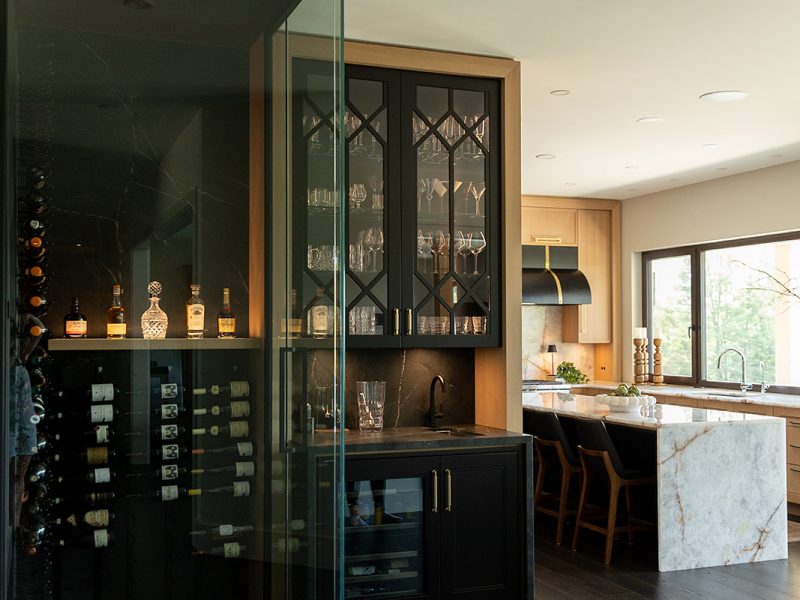 Custom bar cabinet beside kitchen