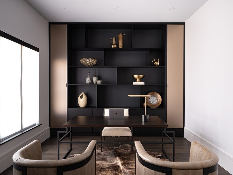 Dark home office with metal shelves
