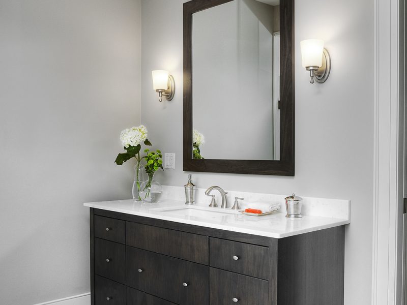 Dark wood ensuite cabinets