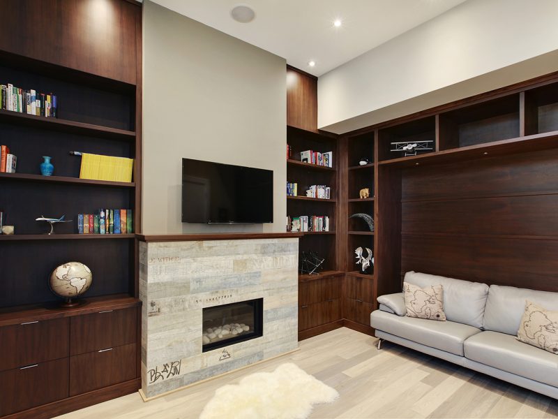 Dark wood shelves in living room