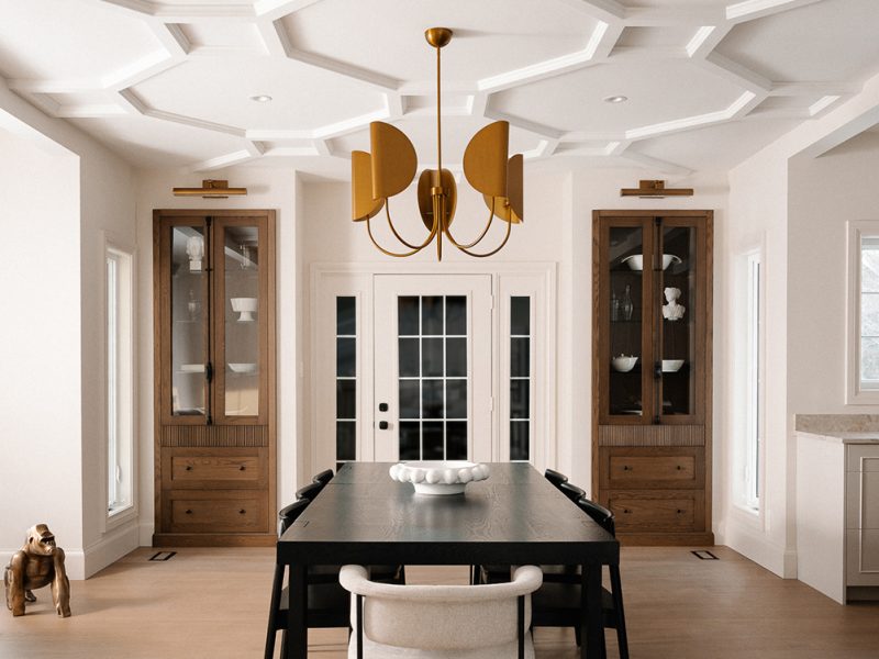 Dining room with dramatic ceiling detail and matching white oak cabinets