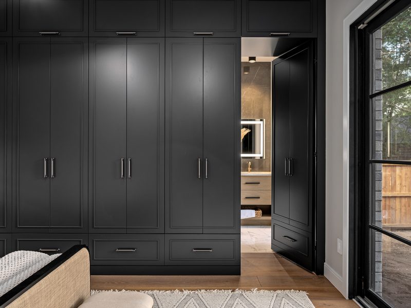 Bedroom with hidden door into ensuite