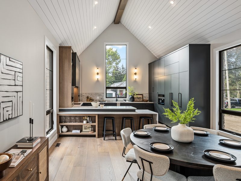 Dark painted and light wood kitchen cabinets