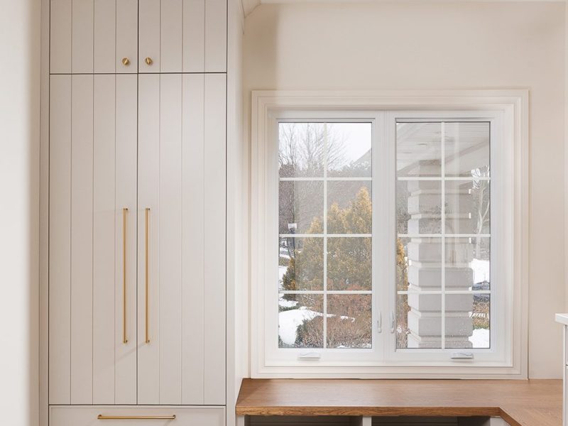 Laundry mudroom combination with closet cabinet and bench