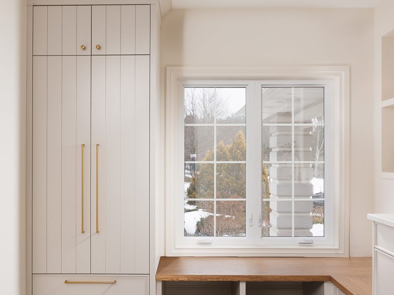 Laundry mudroom combination with closet cabinet and bench