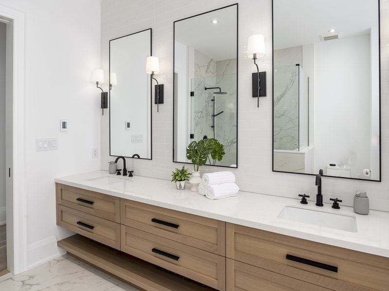 Light wood with black hardware primary ensuite vanity