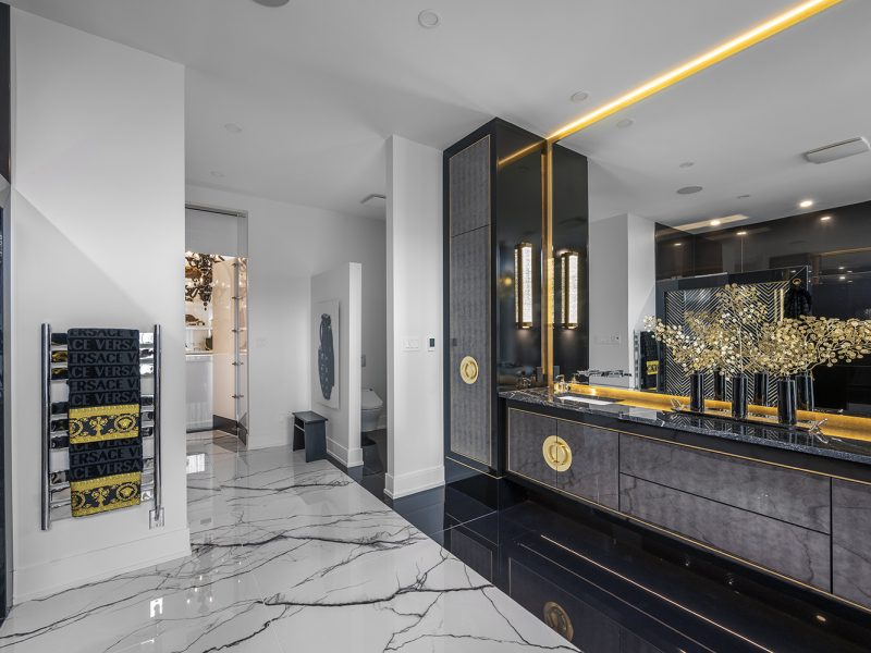 Modern black and white ensuite with colourful vanity