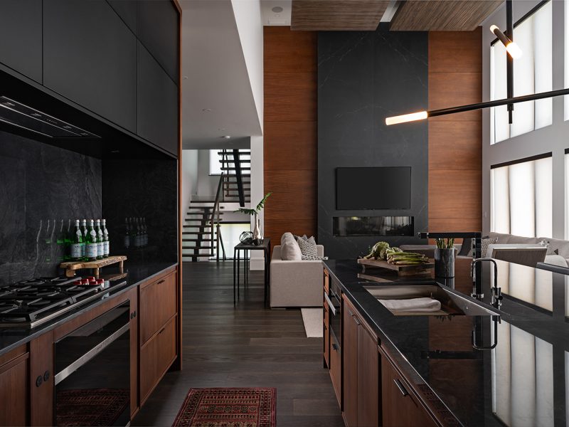 Moody open concept kitchen into living room