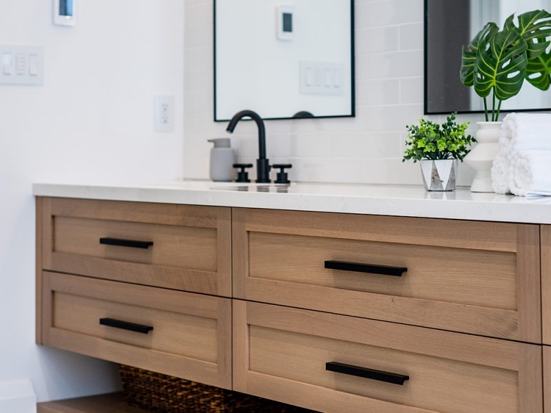 Open cubby beneath vanity