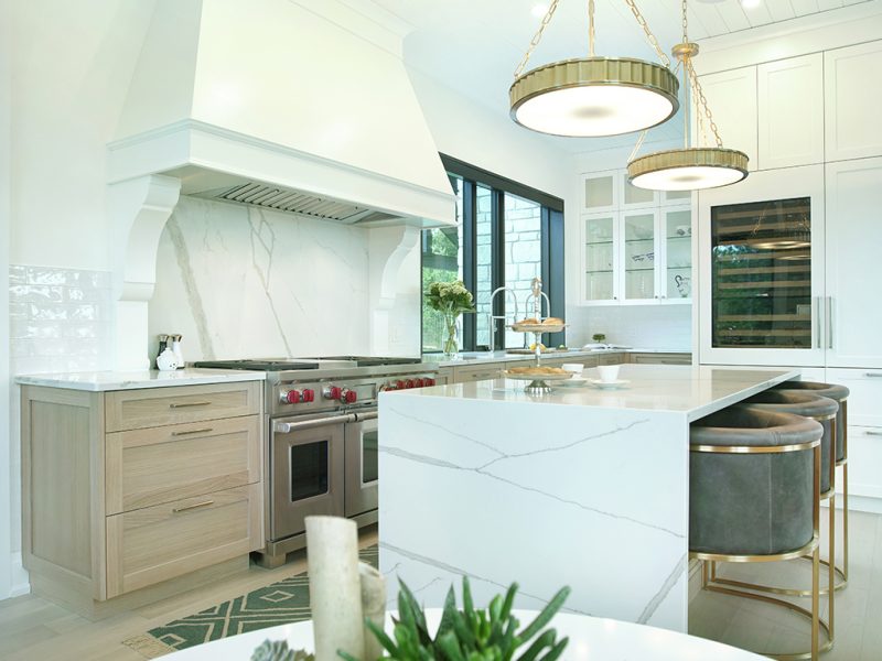 Oversize range hood in kitchen