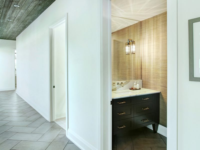 Powder room with black vanity