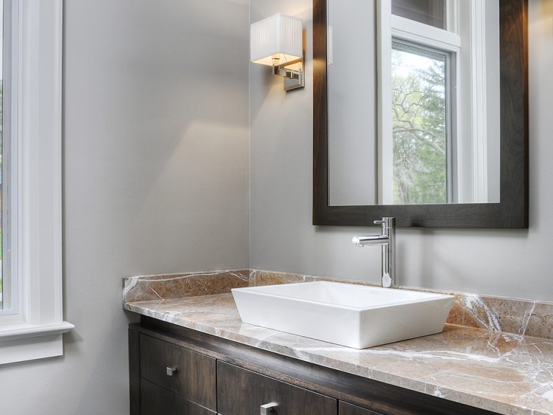 Primary ensuite dark stained vanity