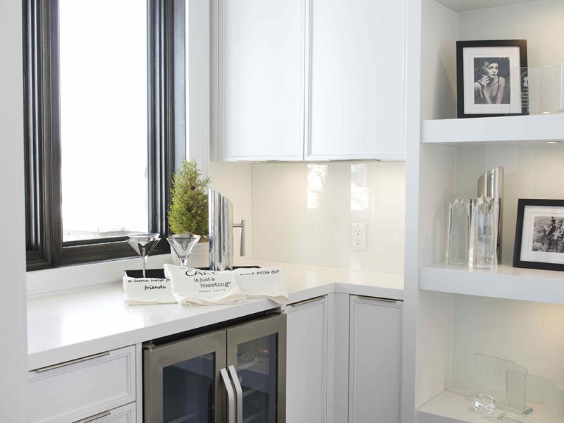 Small white pantry with open shelves