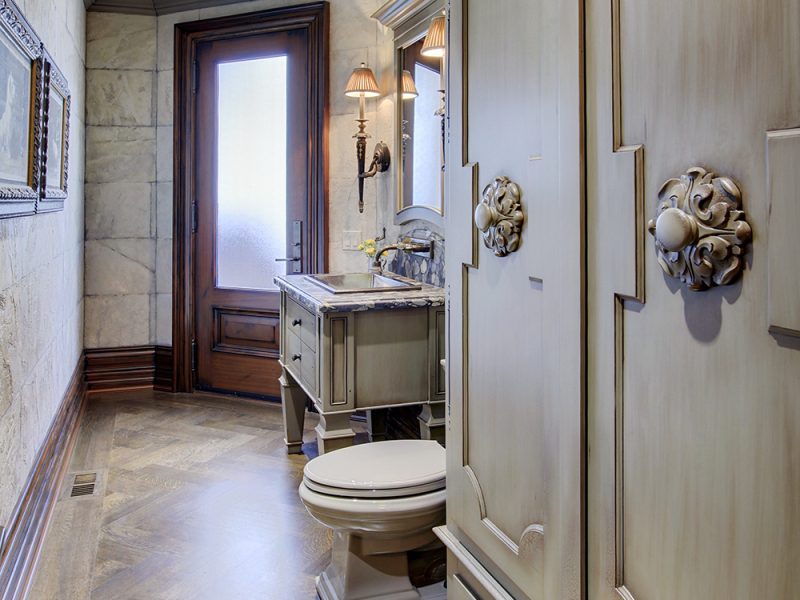 Traditional ensuite cabinets with decorative applique