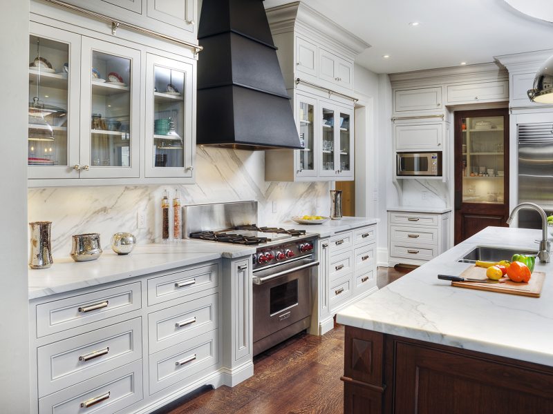 Framed cabinetry with glass display cabinets