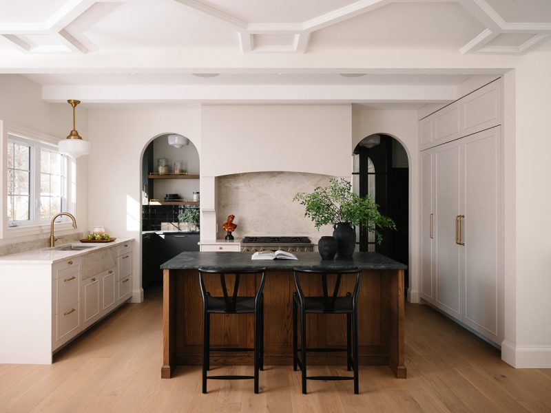 White oak island with white painted cabinets