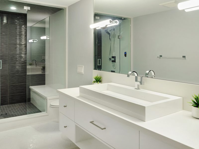 White vessel sink on white vanity
