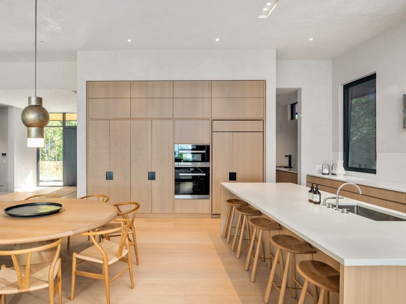 Wood cabinets around wall ovens