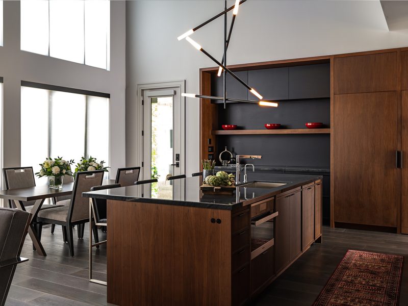 Walnut kitchen cabinets with matte black accents