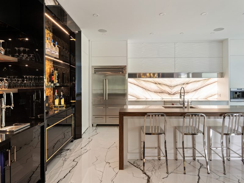 White and black modern kitchen with bar