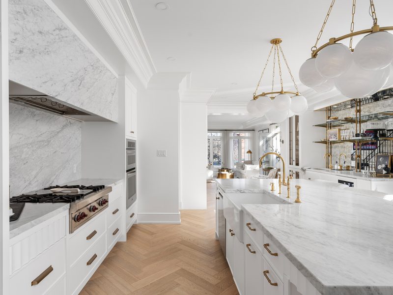 White kitchen with gold accents