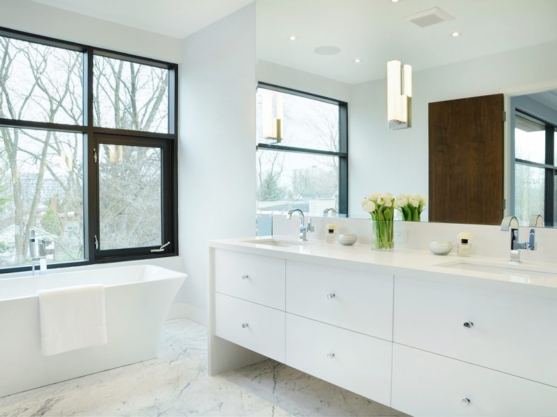 White modern vanity with two sinks