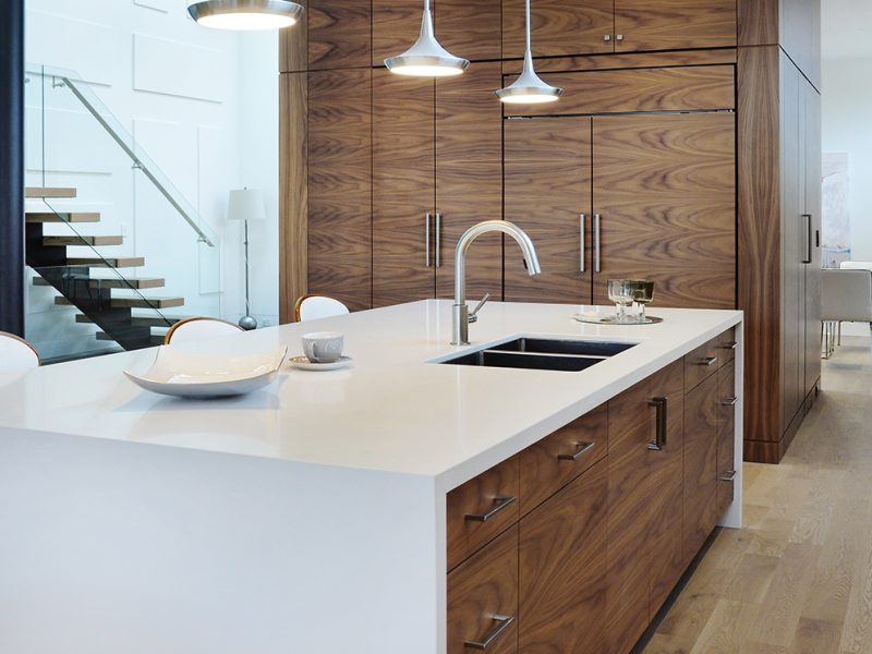 White waterfall countertop on kitchen island