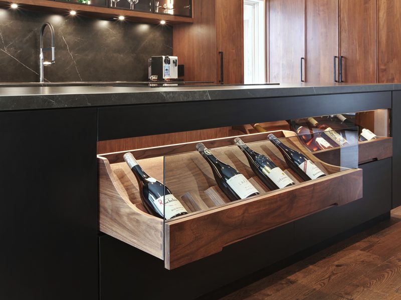 Glass wine storage inside kitchen island